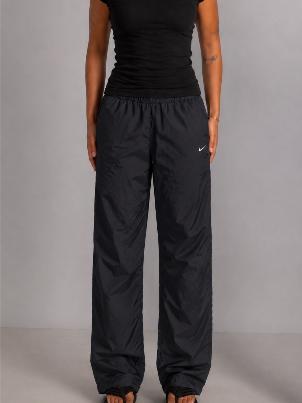 Nike Black Women's Windbreaker Track Pants with zipper on bottom